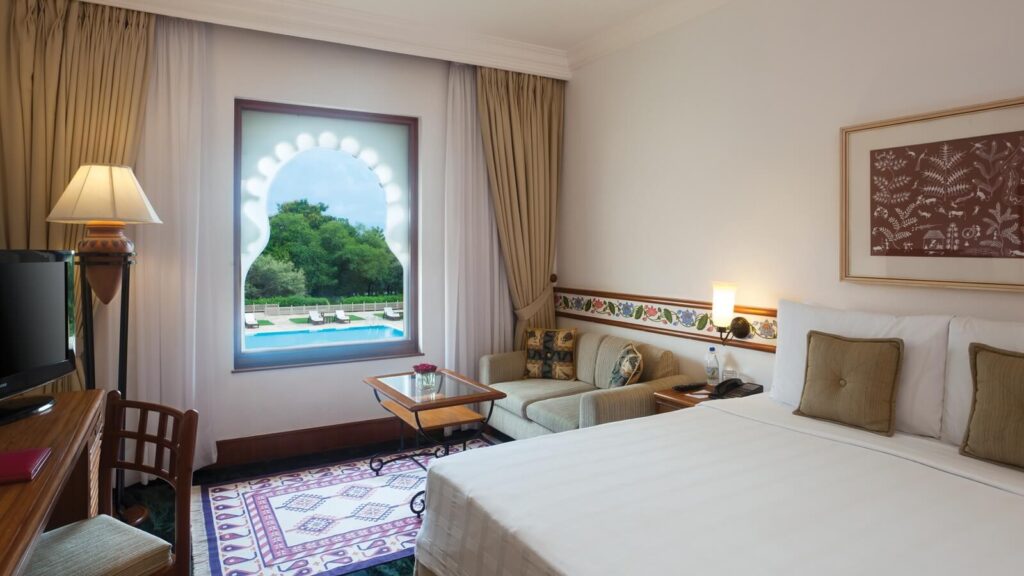 2. Hospitality - Trident- udaipur - Deluxe-pool-view-room-at-The-Trident